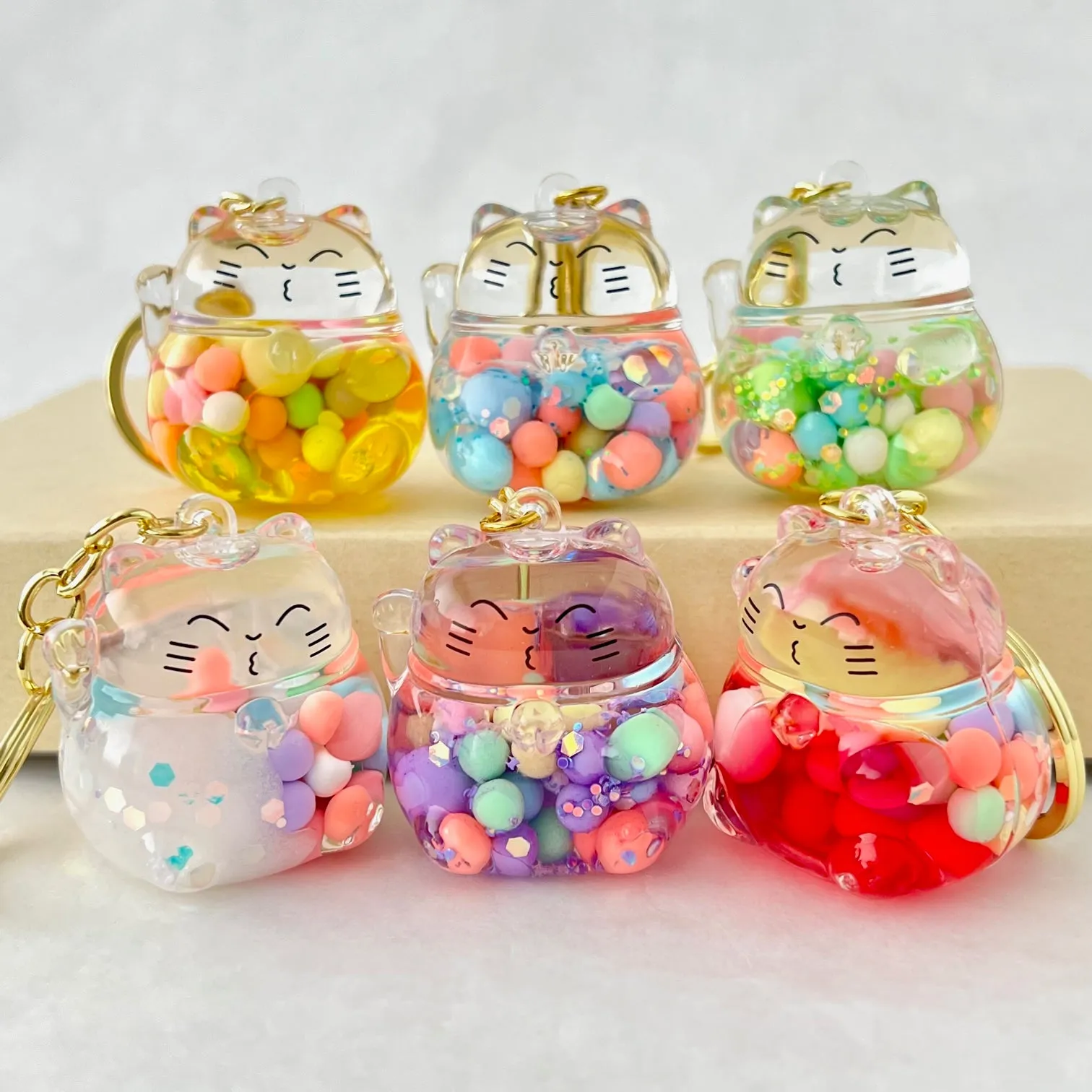 12148 BUBBLE CAT FLOATY KEY CHARM-12