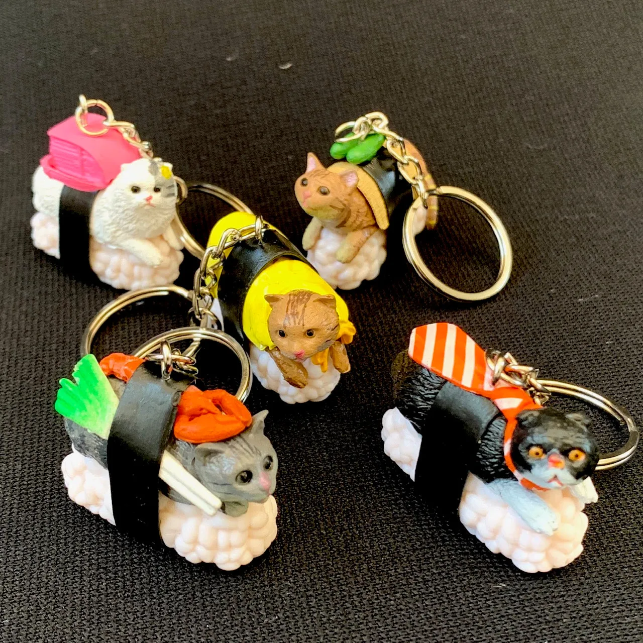 X 12050 SUSHI CAT KEY CHARM-DISCONTINUED