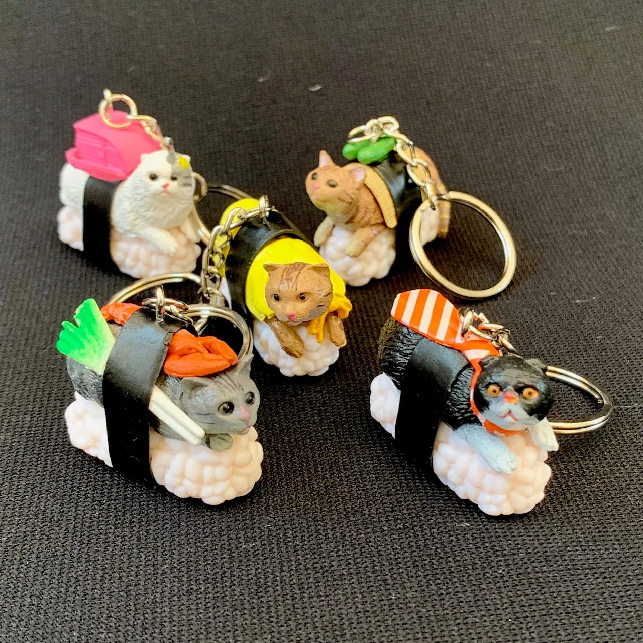 X 12050 SUSHI CAT KEY CHARM-DISCONTINUED