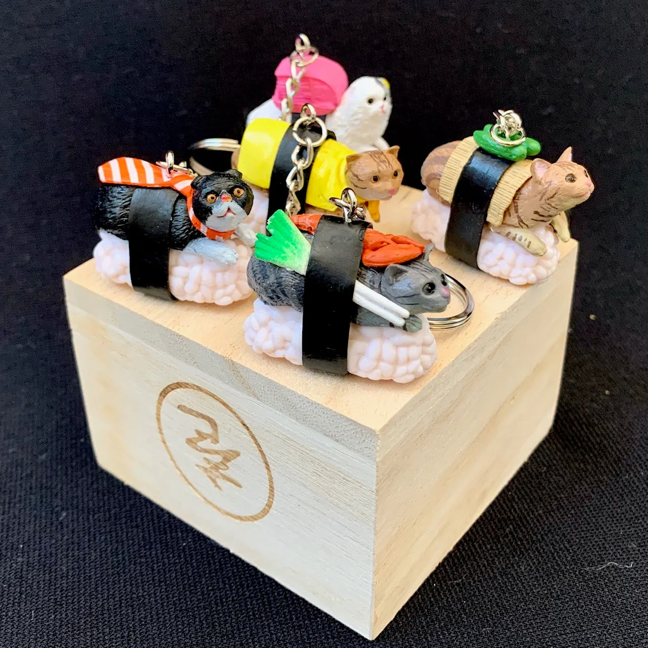 X 12050 SUSHI CAT KEY CHARM-DISCONTINUED