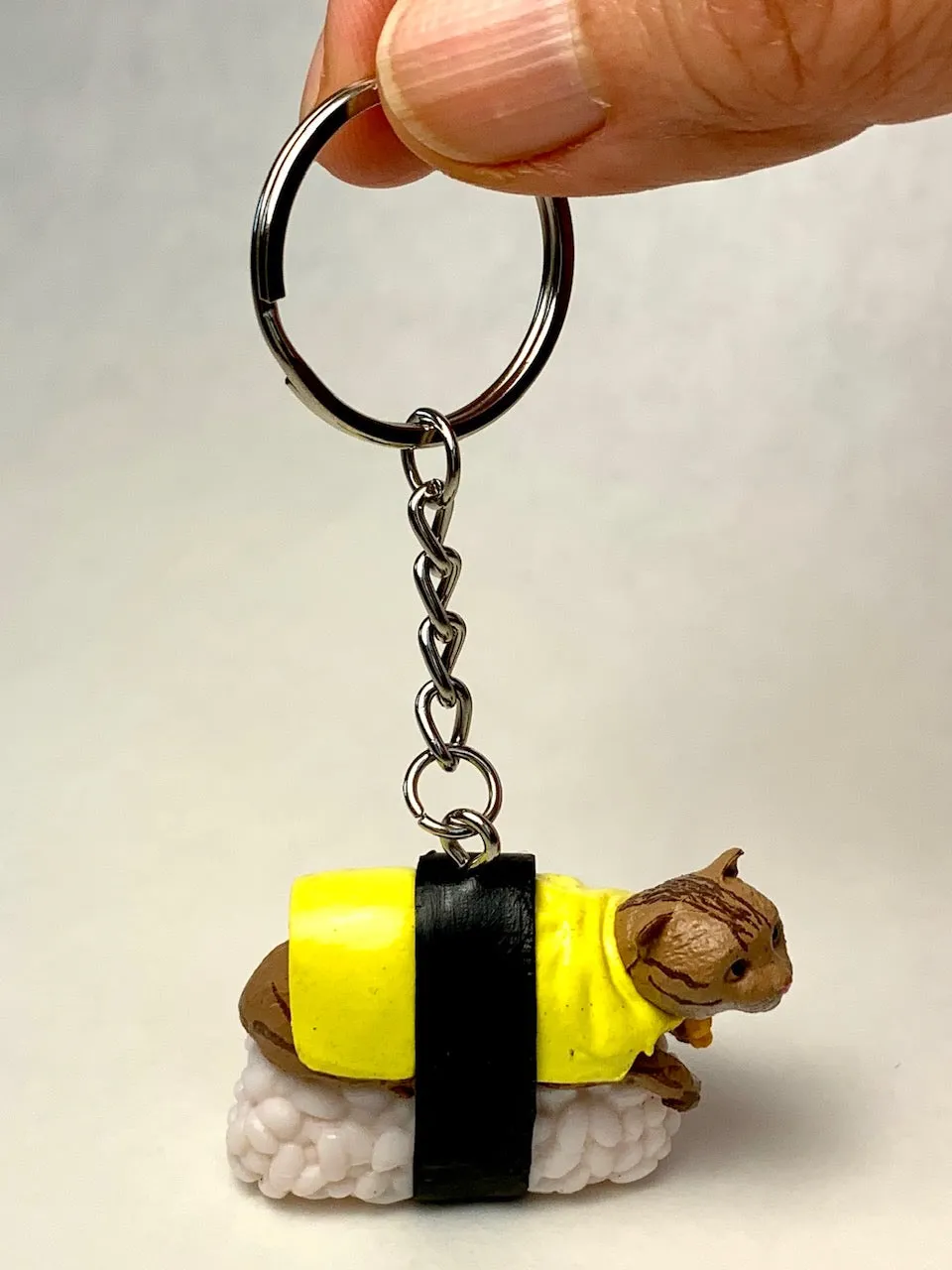 X 12050 SUSHI CAT KEY CHARM-DISCONTINUED