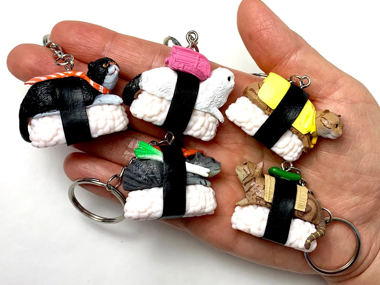 X 12050 SUSHI CAT KEY CHARM-DISCONTINUED