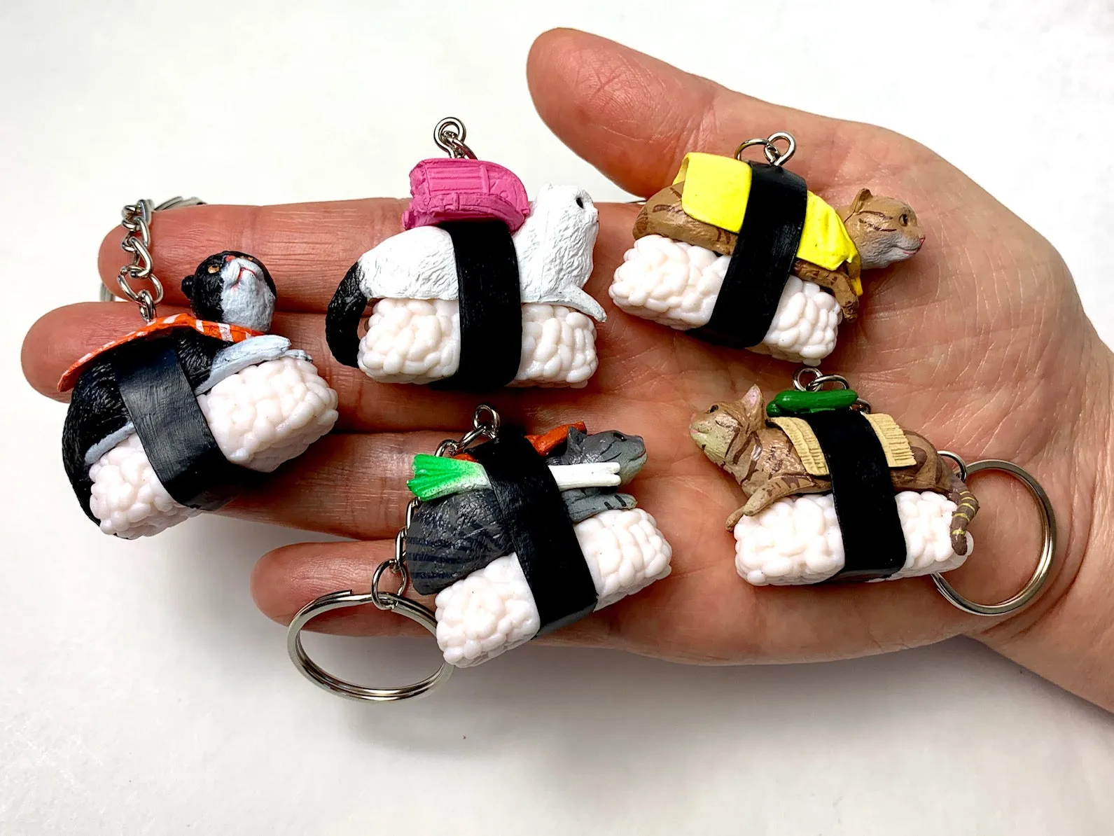 X 12050 SUSHI CAT KEY CHARM-DISCONTINUED