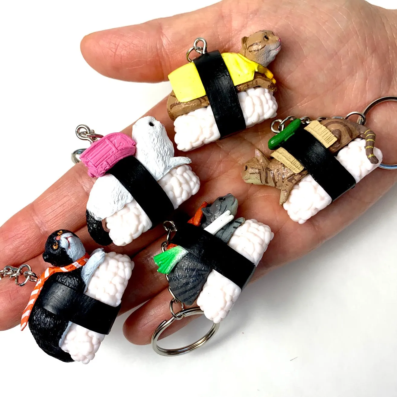 X 12050 SUSHI CAT KEY CHARM-DISCONTINUED
