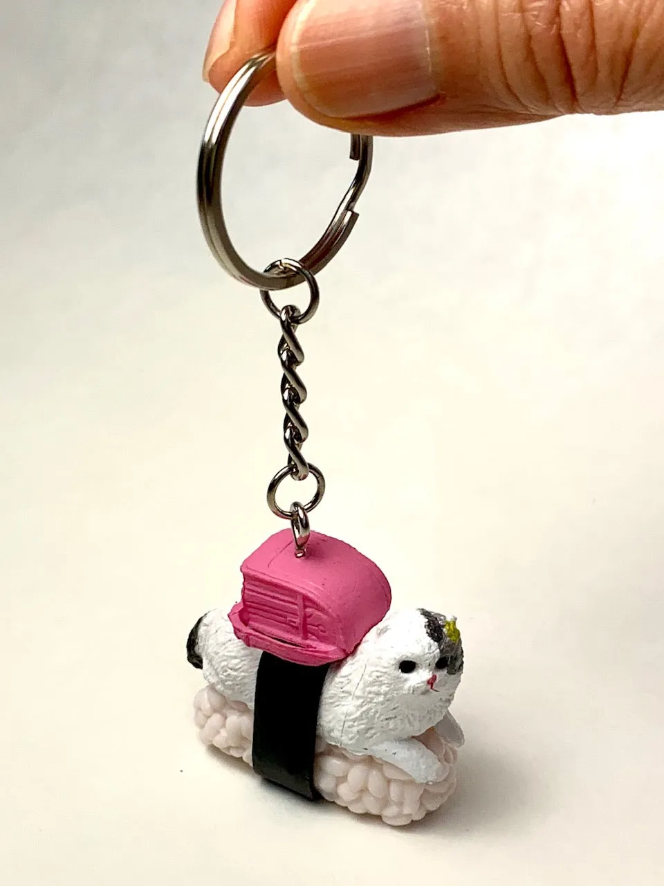 X 12050 SUSHI CAT KEY CHARM-DISCONTINUED