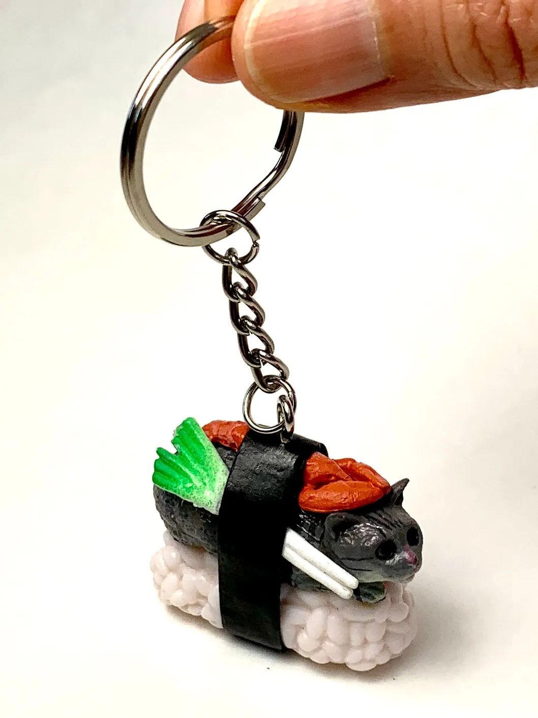 X 12050 SUSHI CAT KEY CHARM-DISCONTINUED