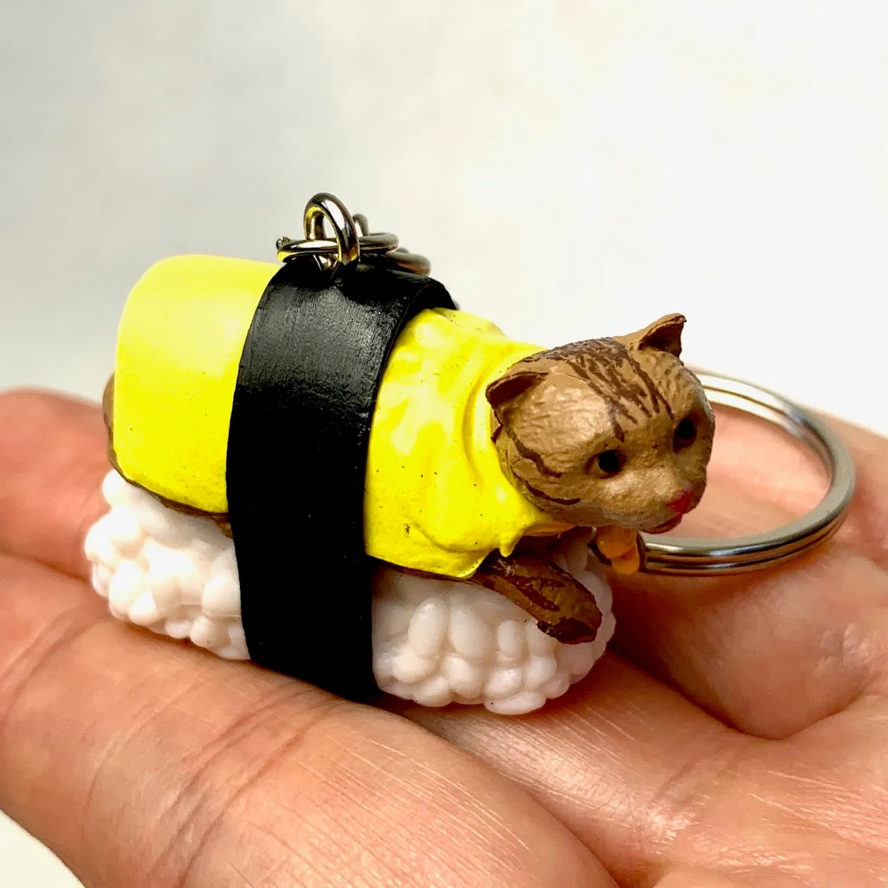 X 12050 SUSHI CAT KEY CHARM-DISCONTINUED