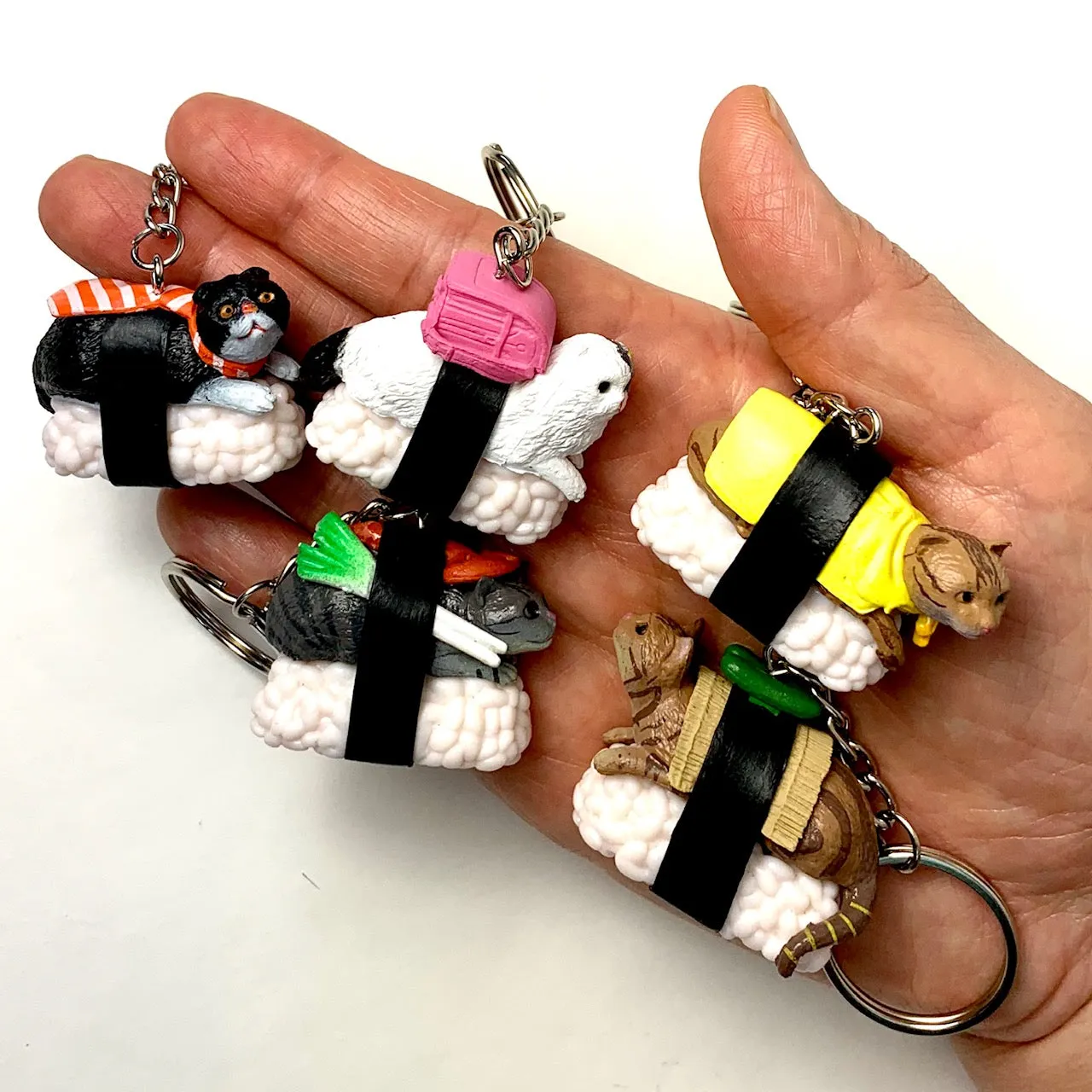 X 12050 SUSHI CAT KEY CHARM-DISCONTINUED
