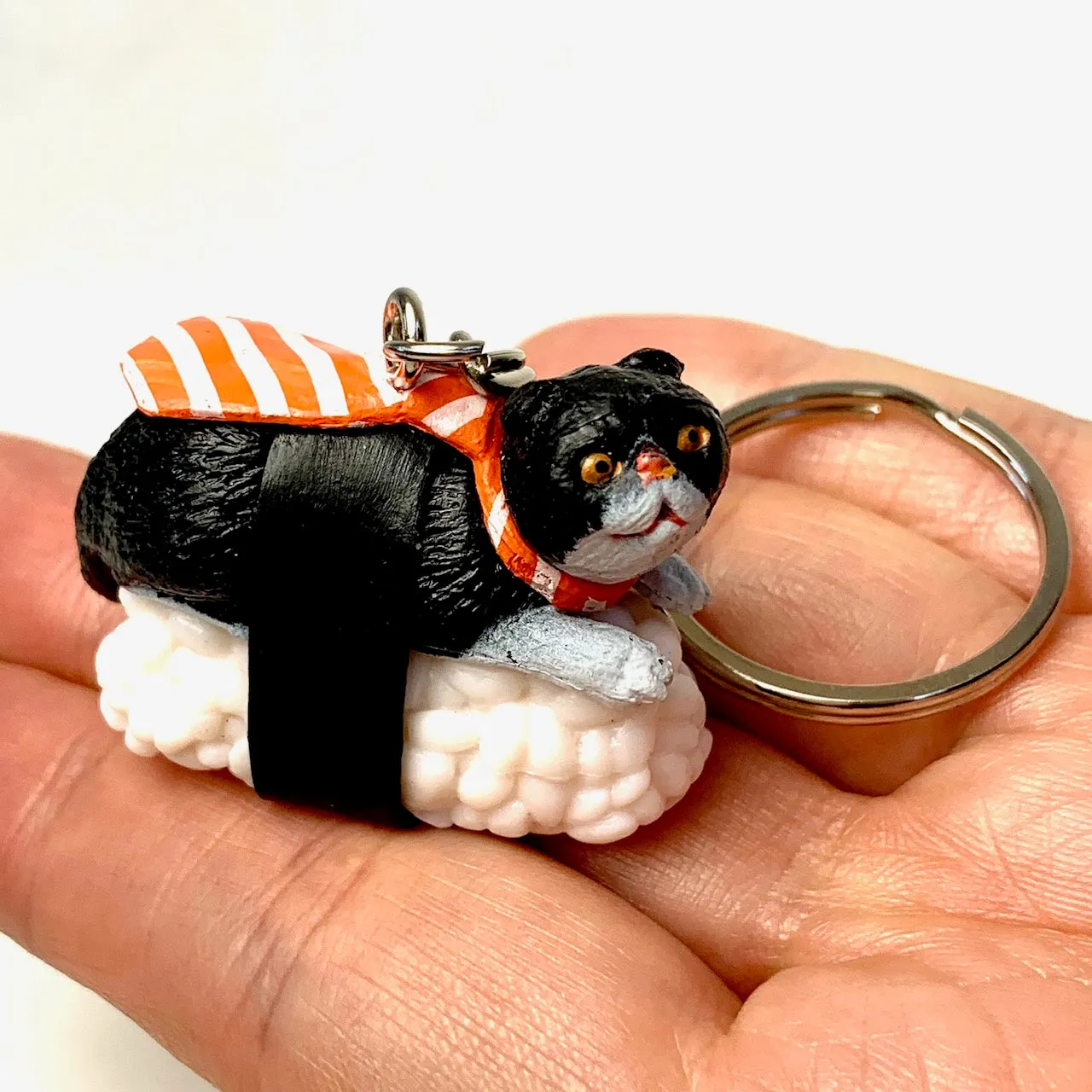 X 12050 SUSHI CAT KEY CHARM-DISCONTINUED